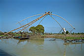 Along the Stung Sangker river, from Siem Reap to Battambang - fishing net of early Chinese design, with a counterweighted beam used for raising and lowering the net.